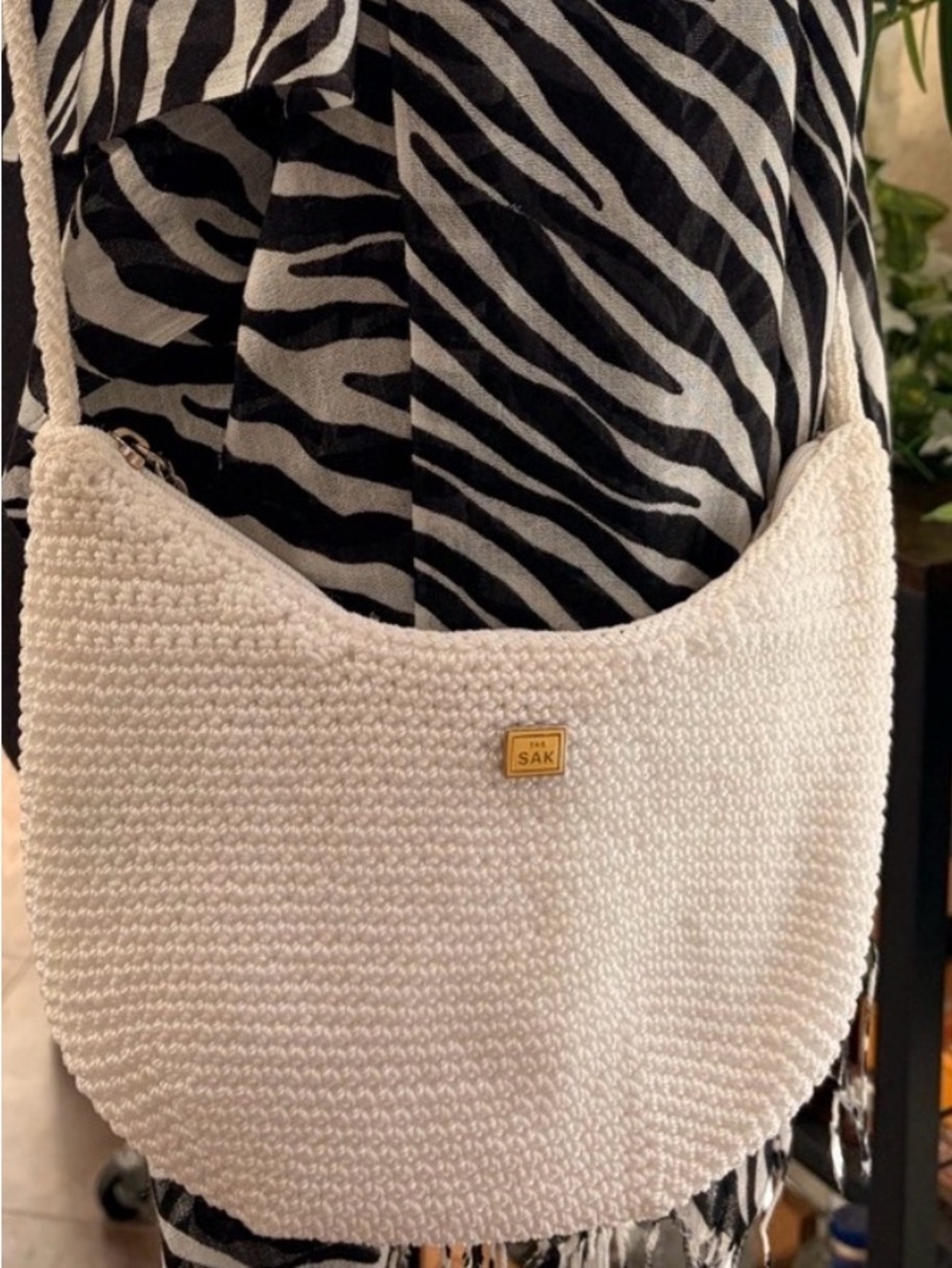 The Sak Rich White Crochet Crescent Crossbody Bag